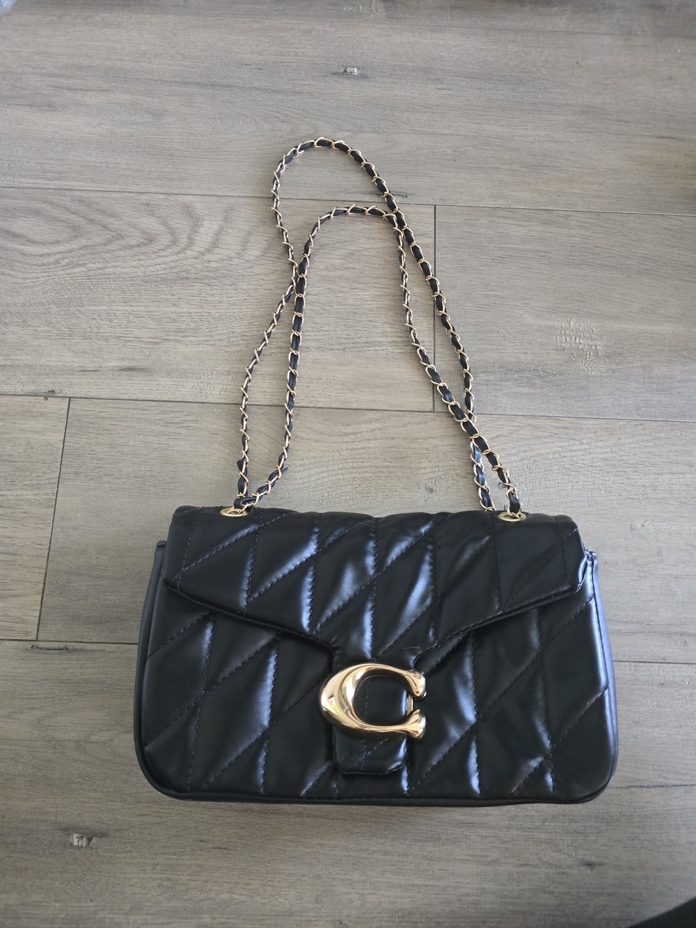 Black Quilted Shoulder Bag with Gold Chain Strap